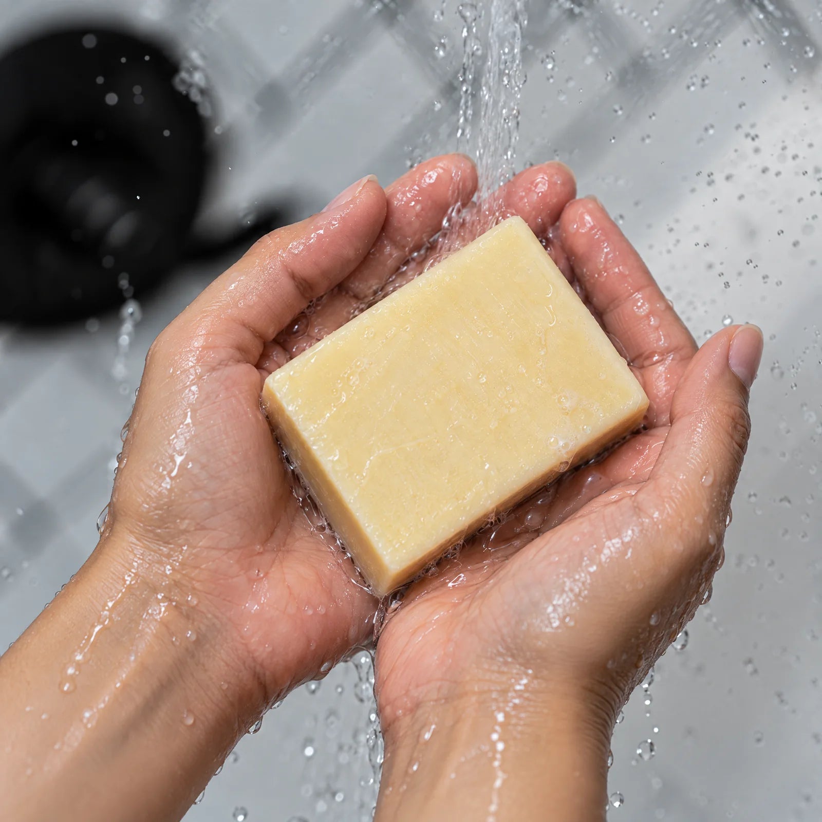Remainder Lemon Litsea tallow bar soap: in the hands under water