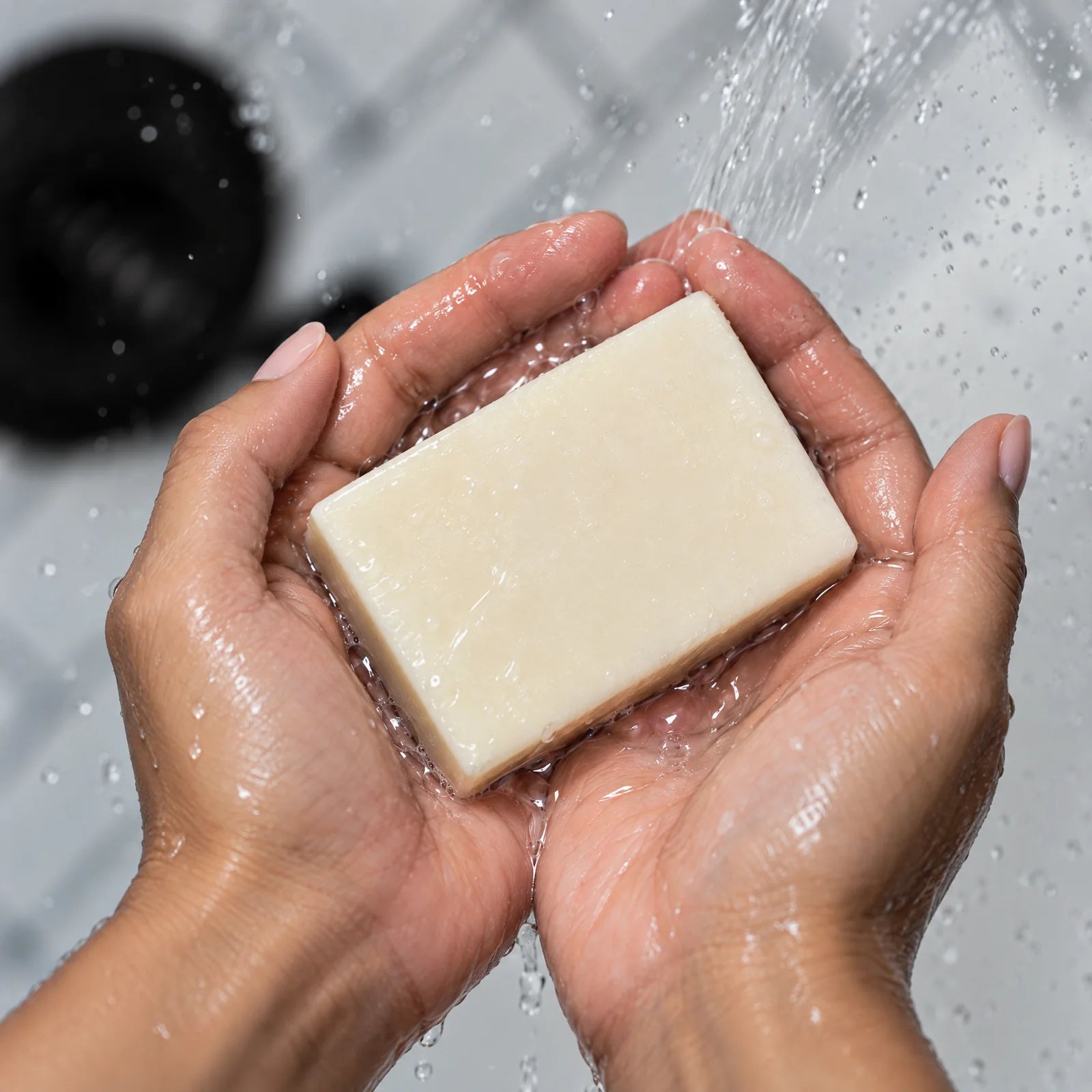 Remainder Unscented tallow bar soap: in the hands under water